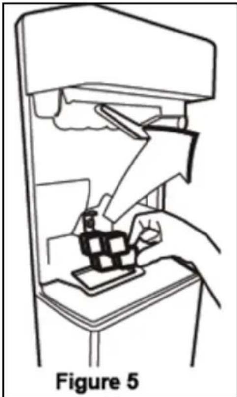 Line drawing of a hand using a tool to interact with a device, labeled Figure 5 (no text or symbols on the diagram itself).