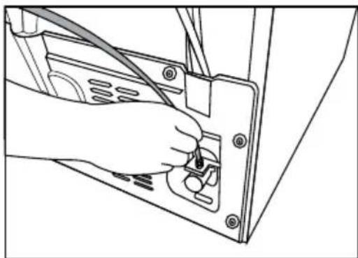Line drawing of a hand inserting a cable into a device panel (no text or symbols).