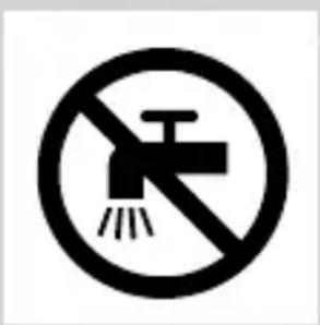 Prohibition sign with a faucet symbol and diagonal line, indicating no fire or water discharge.