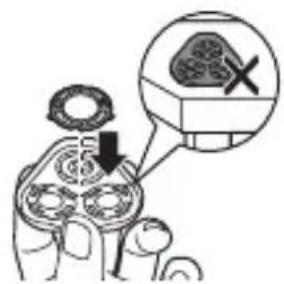 Diagram illustrating a surgical procedure with labeled components and a magnified view of a surgical tool.