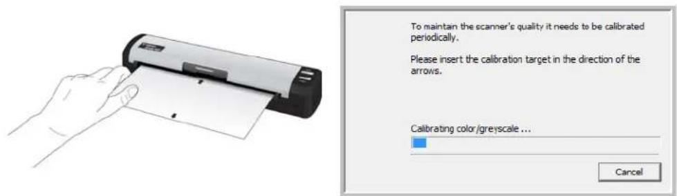 To maintain the scanner's quality it needs to be calibrated periodically. Please insert the calibration target in the direction of the arrows. Calibrating color/greyscale ... Cancel
