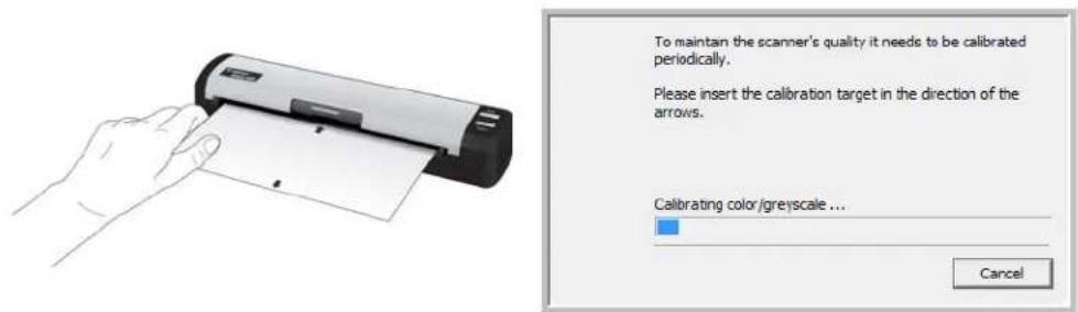 To maintain the scanner's quality it needs to be calibrated periodically. Please insert the calibration target in the direction of the arrows. Calibrating color/greyscale ... Cancel