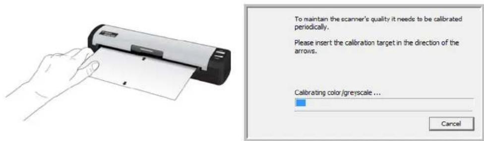 To maintain the scanner's quality it needs to be calibrated periodically. Please insert the calibration target in the direction of the arrows. Calibrating color/greyscale ... Cancel