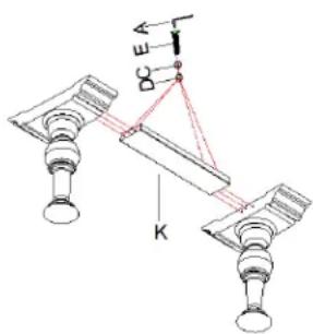 Technical diagram showing mechanical assembly with labeled components and directional arrows