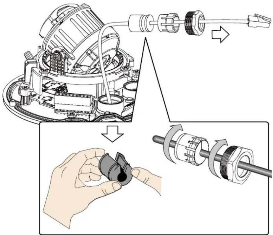 Technical diagram illustrating the assembly of a mechanical device with labeled components and a hand holding a connector.