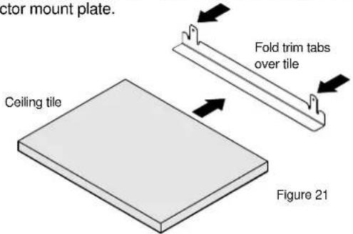 actor mount plate. Fold trim tabs over tile Ceiling tile Figure 21