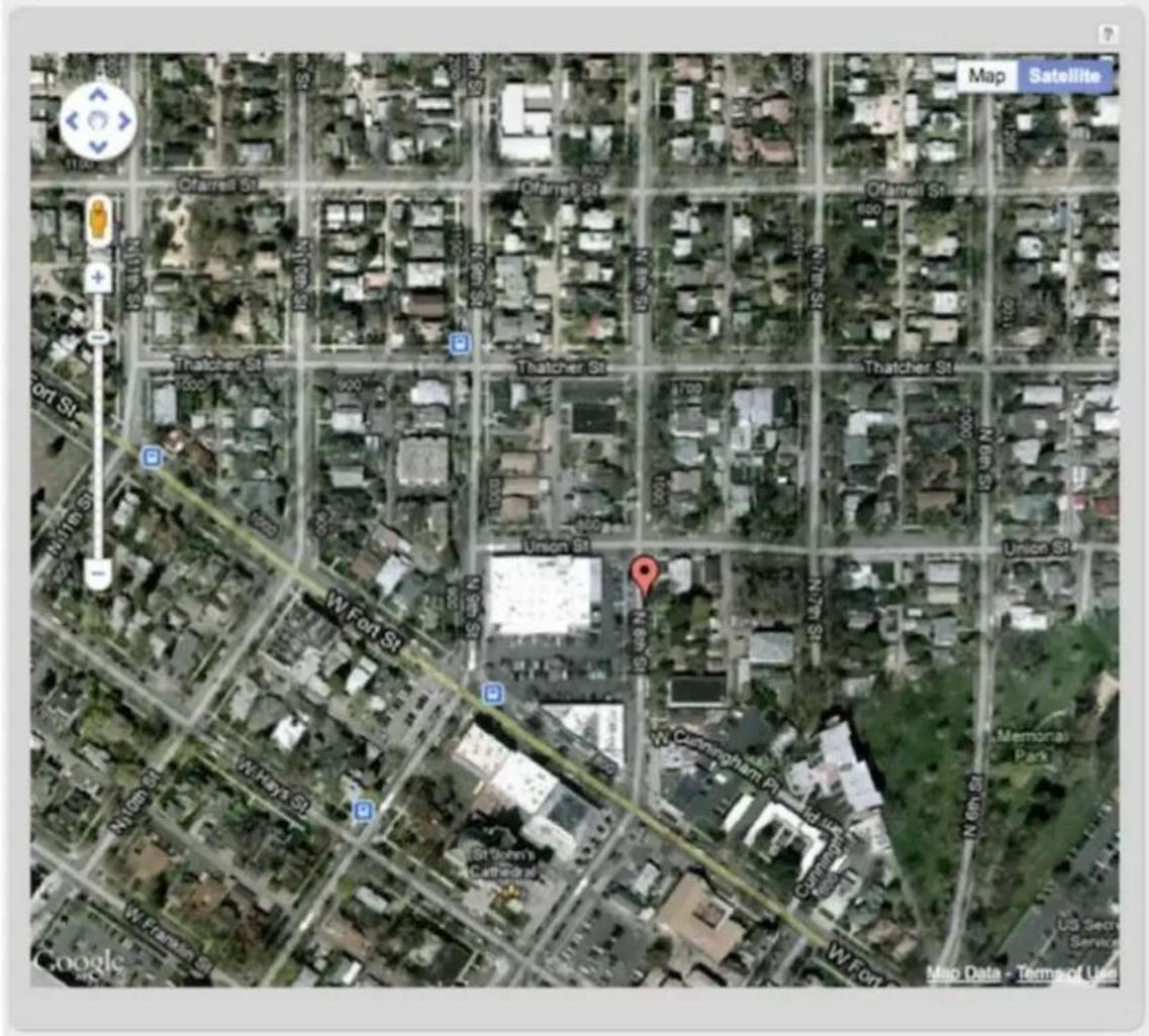 Satellite map image with labeled street names and location markers, including Google and Satellite tabs