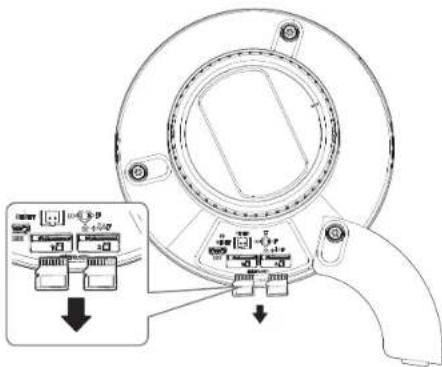 Technical diagram of a device component with labeled parts and an inset showing internal components with arrows indicating assembly or adjustment.