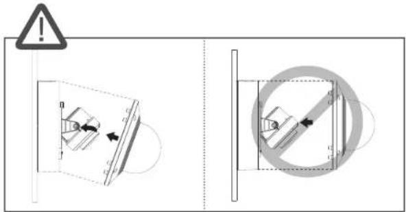Technical diagram showing two mechanical assembly states with warning symbols and directional arrows indicating movement or force.