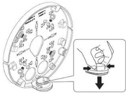 Diagram illustrating a mechanical assembly with labeled components and a magnified view showing a hand pressing a component.