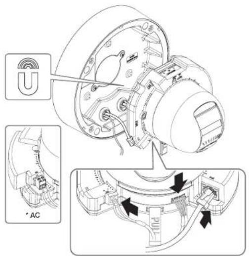 Technical diagram of a mechanical assembly with labeled components and directional arrows indicating movement or flow.