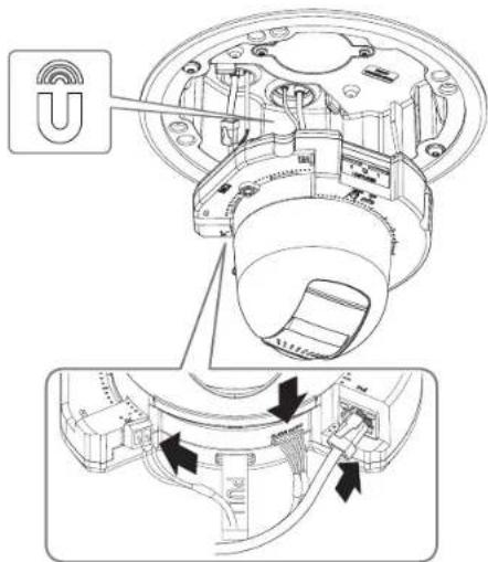 Technical diagram of a mechanical assembly with labeled components and directional arrows indicating movement or flow.
