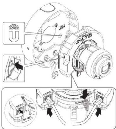 Technical diagram of a mechanical assembly with labeled components and directional arrows indicating assembly steps.