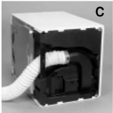 Interior view of a white industrial box with exposed internal components and coiled tubing (no text or symbols visible)