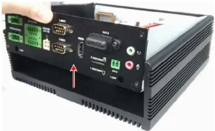 Device rear panel with labeled ports and connectors, showing a hand pointing to a component with a red arrow indicating direction.
