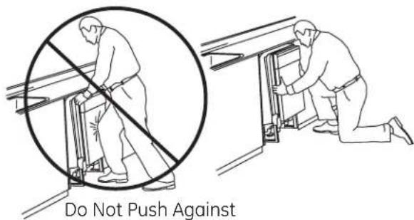 GE EDW6100NCC - STEP 10: SLIDE DISHWASHEF THREE-FOURTHS OF THE WAY INTO CABINET - 1
