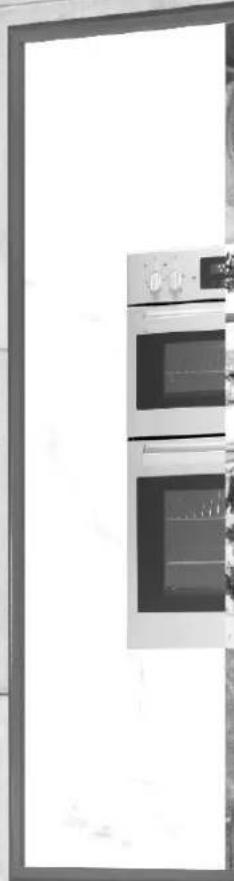 Exterior view of a modern building facade with large windows and a small door (no visible text or symbols)