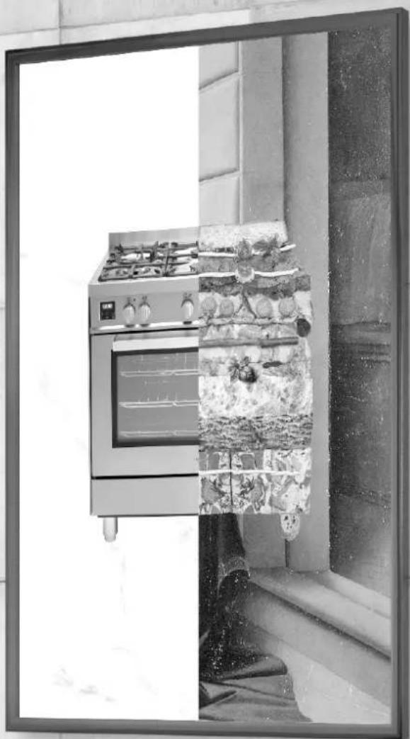 Black-and-white photo of a kitchen oven with visible stove and grilles, partially obscured by a mirror reflection (no text or symbols)