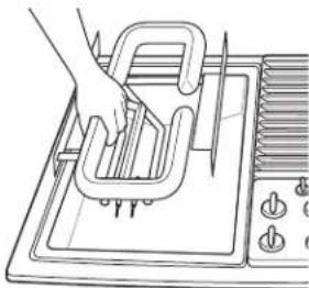 GE Profile JGP990WELWW - Care and cleaning of the cooktop. - 1