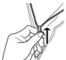Illustration of a hand holding a tool with an arrow indicating direction (no text or symbols).