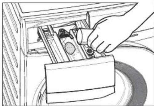 Hand operating a mechanical device with a cylindrical component inserted into a housing (no text or symbols visible).