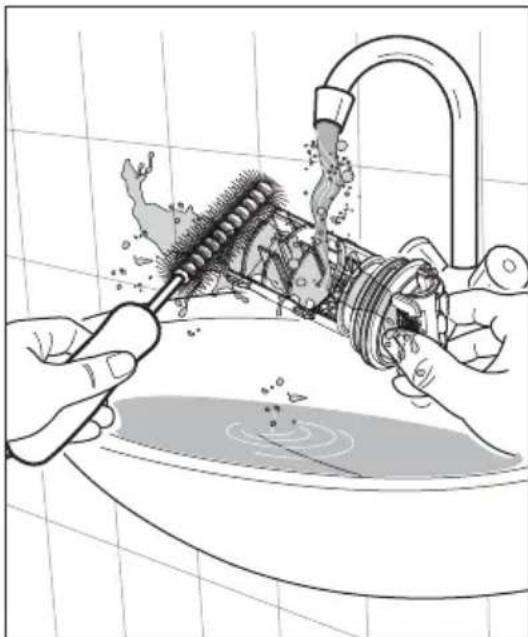 Illustration of hands cleaning a bathroom sink with a showerhead and cleaning tool (no text or symbols).