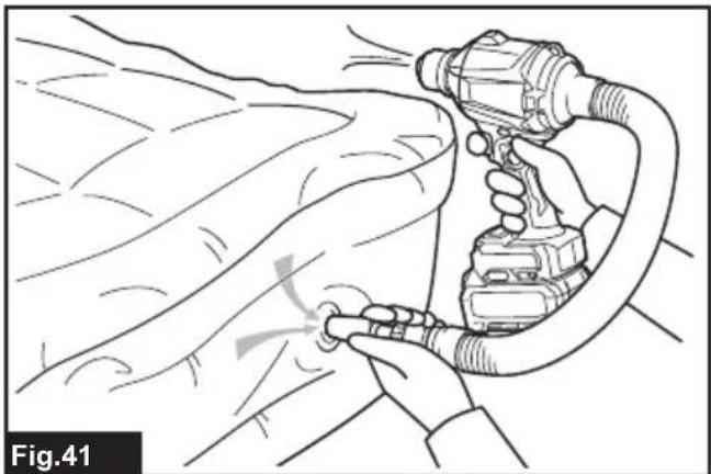 Line drawing of a person using a handheld tool to interact with another person's arm (no text or symbols present)