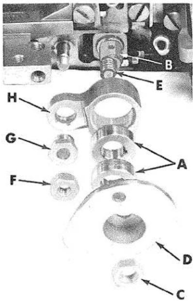 Labeled mechanical assembly diagram with numbered components A through H
