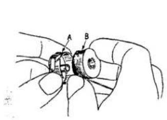 Union Special 61400G - THREADING THE BOBBIN CASE - 1