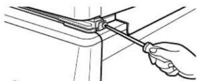 Illustration of a hand using a tool to adjust or install a mechanical component (no text or symbols visible)