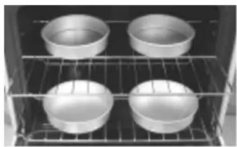 FRIGIDAIRE FGEF3077KB - Baking layer cakes with 1 or 2 oven racks - 1