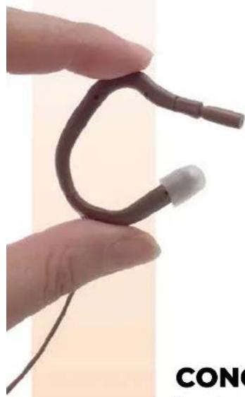 Close-up of a hand holding a flexible, curved mechanical component (no visible text or symbols)