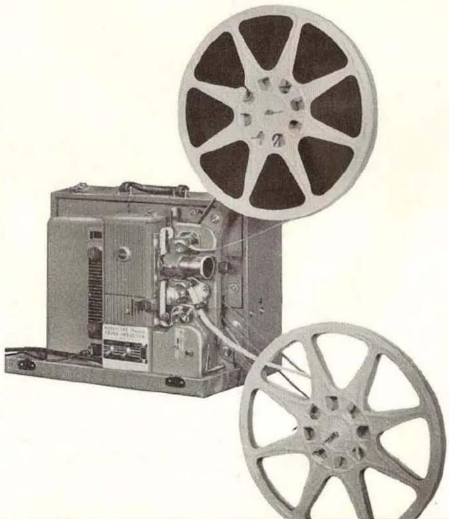 Vintage film projector with two reels, shown from different angles (no visible text or symbols)