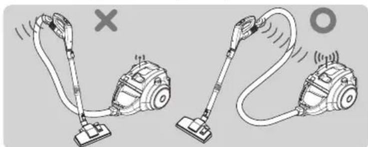 Illustration of two different vacuum cleaner setups with sensor waves, no text or symbols present