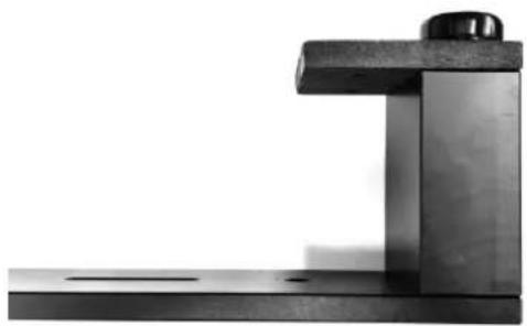 Close-up of a metallic mechanical bracket with a cylindrical top and base plate (no text or symbols visible)