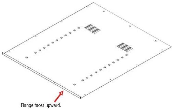 Flange faces upward.