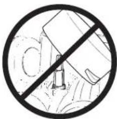 Crosshair symbol of a vehicle against a road intersection, no text or labels present