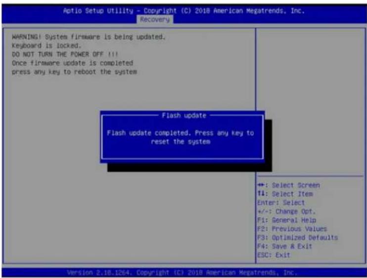 Aptio Setup Utility - Copyright (C) 2018 American Megatrends, Inc. Recovery WARNING! System firmware is being updated. Keyboard is locked. DO NOT TURN THE POWER OFF !!! Once firmware update is completed press any key to reboot the system Flash update Flash update completed. Press any key to reset th…