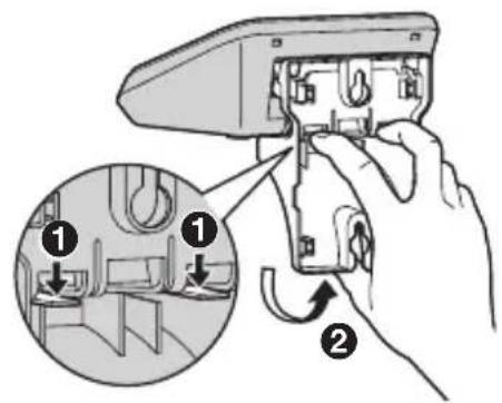 Diagram showing hand operating a switch with labeled parts and directional arrows indicating adjustment or operation.