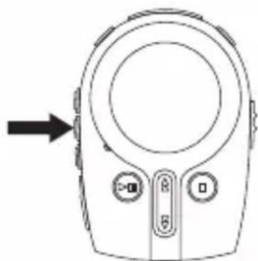 Line drawing of a handheld device with circular dial and control buttons (no text or symbols)