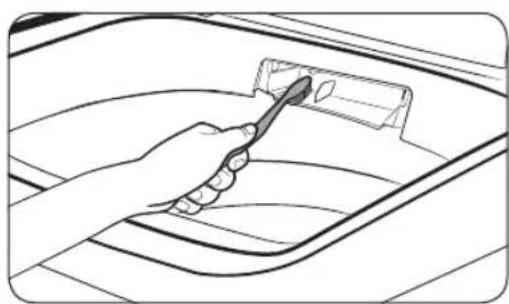 Line drawing of a hand using a tool to clean or store items inside a vehicle (no text or symbols)