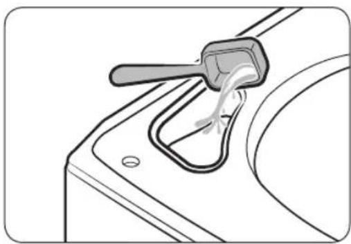 Diagram of a hand holding a tool near a curved surface, showing fluid or material flow (no text or symbols)