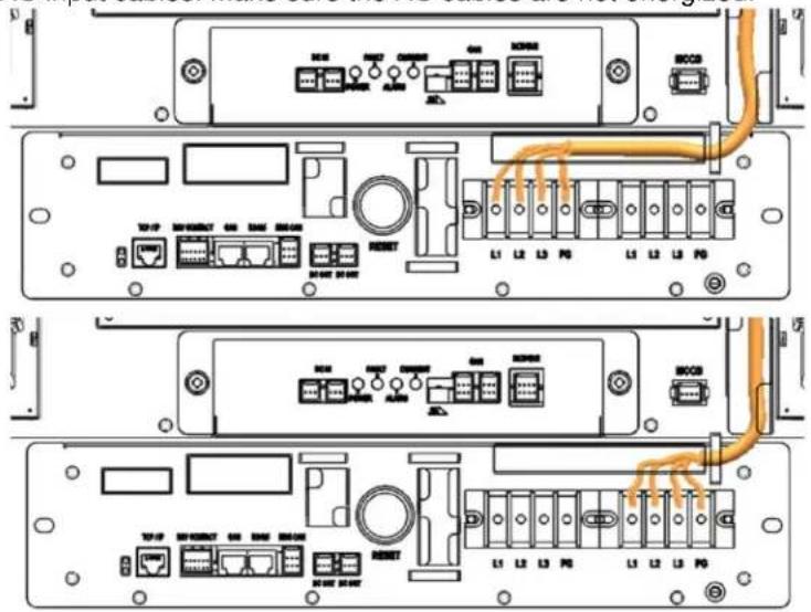 APC LIBATTSMGGIEC - Remove the protective covers from the AC input terminals. - 2
