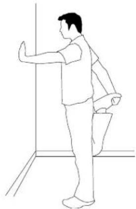 Line drawing of a person standing in a doorway, viewed from the side (no text or symbols)