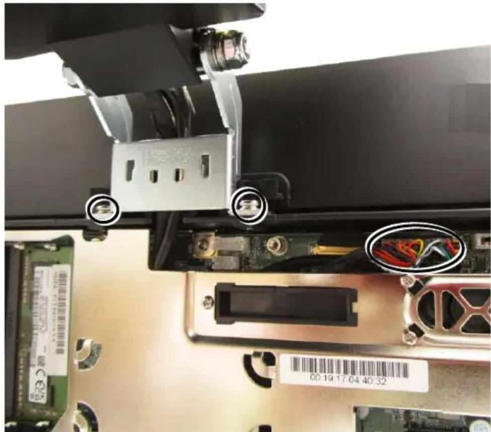 Close-up of a computer motherboard showing CPU socket, RAM slots, and cable connectors (no readable text or symbols)