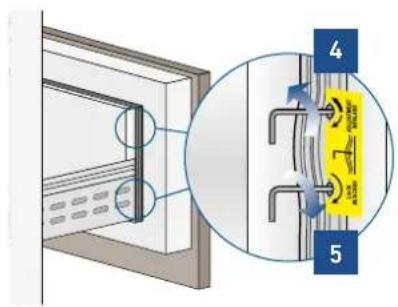 Diagram showing a mounted device with labeled parts and a magnified view of a yellow warning label on the wall.