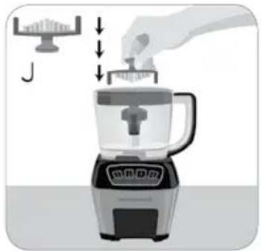 Illustration of a blender with a hand placing a small object into it, showing no text or symbols.