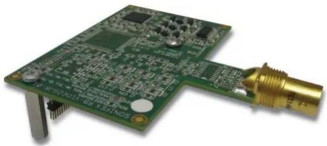 Close-up of a green printed circuit board with gold connectors and electronic components (no visible text or symbols)