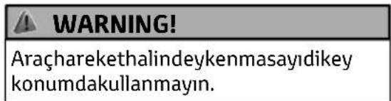 WARNING! Araçharekethalindeykenmasayıdikey konumdakullanmayın.