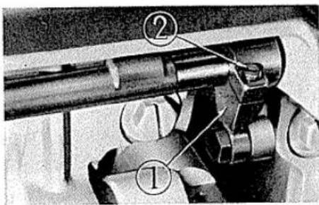 Technical diagram of a mechanical device with numbered components, likely for assembly or maintenance reference.
